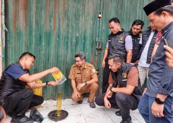 Sidak Pasar Angso Duo, Tim Satgas Pangan Polda Jambi Cek Takaran Minyak Kita