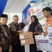 Gubernur Al Haris Didampingi Wabup dan Ketua DPRD Serahkan Dumisake Pendidikan di Tanjab Timur