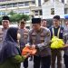 Polda Jambi Berbagi Berkah Ramadhan: Ratusan Paket Takjil Serta Sembako Diserahkan Ke Pengendara Dan Warga